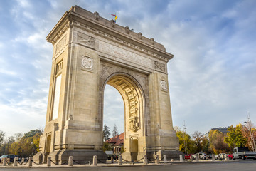 The Triumphal Arch (Arcul de Triumf) in Bucharest, Romania - obrazy, fototapety, plakaty