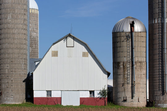 Grouping of Silos and a Barn in Rural United States