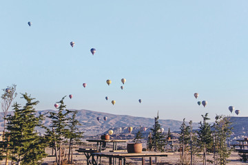 Fototapeta na wymiar hot air balloons in sky at Goreme viewpoint in Turkey