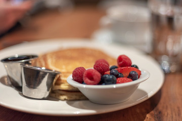 Pancakes with berries on the side