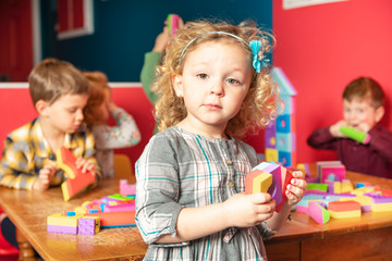 The preschoolers group in kindergarten together, Nursery group play with block ,