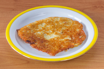 Polish placki ziemniaczane. Potato pancakes, latkes, deruny or boxties