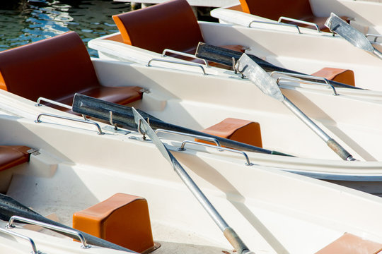 Beautiful white boats with oars in Versailles, France