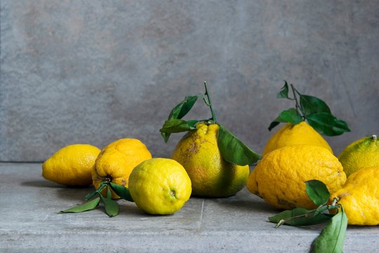Close up of lemons and ugli fruit