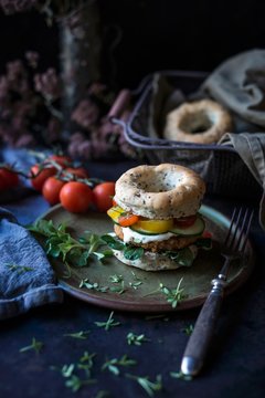 Linseed bagel burger served on plate
