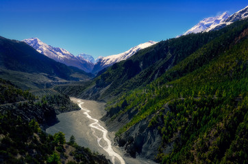 Fototapeta na wymiar Landscape view of mountain valley and river in Himalayas, Annapurna region
