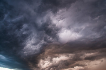 Fototapeta na wymiar Danger colorful cumulonimbus clouds 