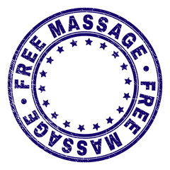 FREE MASSAGE stamp seal imprint with grunge texture. Designed with circles and stars. Blue vector rubber print of FREE MASSAGE label with dust texture.