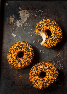 Doughnuts with coloured sprinkles for Halloween
