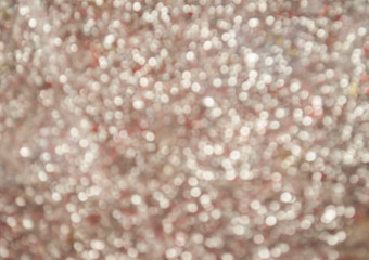 Silver glittery shimmering background with blinking details.