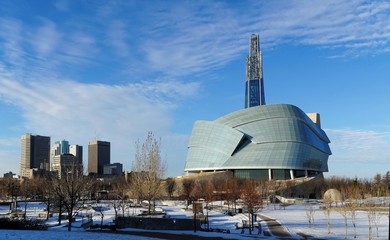 Winnipeg downtown cityscape. Winter view on Canadian Museum for Human Rights seen from The Forks park. Winnipeg, Manitoba, Canada