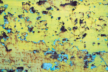 paint of different colors on metal