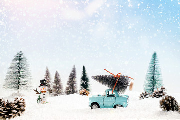 Diecast model car carries the Christmas tree