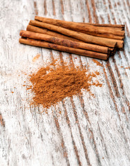 Cinnamon surrounded by rustic background