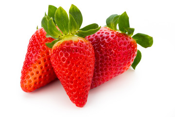 Fresh strawberries close up on white background.