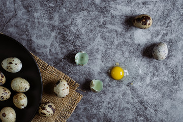 group of quail egg  on cement background, easter concept, top view  