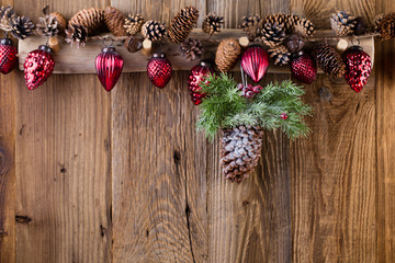 Christmas greeting card. Festive decoration on wooden background. New Year concept. Copy space.  Flat lay. Top view.