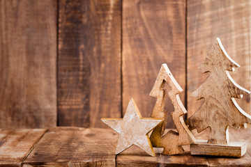 Christmas greeting card wooden background.