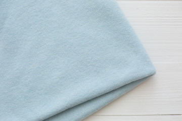background texture. blue color knitted fabric on white background