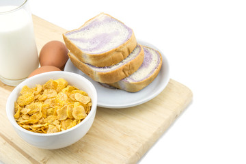 healthy breakfast: cornflakes with milk and bread