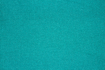 Turquoise texture of binding fabric.Green fabric background.Turquoise fabric.