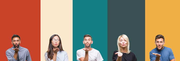 Fototapeta premium Collage of different ethnics young people over colorful stripes isolated background looking at the camera blowing a kiss with hand on air being lovely and sexy. Love expression.