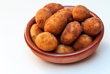 Croquettes surrounded by white background