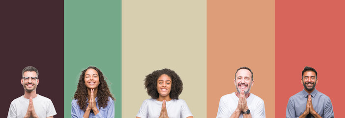 Fototapeta premium Collage of group of young and senior people over colorful isolated background praying with hands together asking for forgiveness smiling confident.