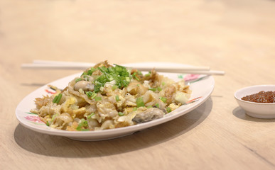 shellfish fried put eggs on table