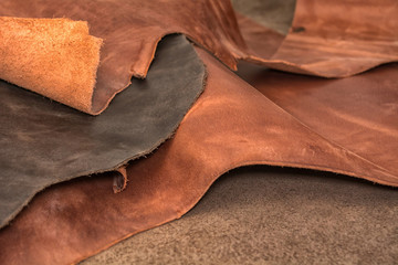 Texture of pieces brown leather. Natural material background