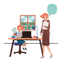 female teacher in the classroom with student and speech bubble