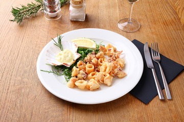 Stockfoto - grilled squid dish with sauce