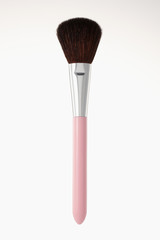 Pink makeup brush in white background