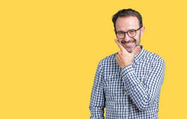 Handsome middle age elegant senior business man wearing glasses over isolated background looking confident at the camera with smile with crossed arms and hand raised on chin. Thinking positive.