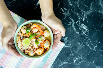 Thai food background. Dishes of thai cuisine.Black stone  table background.