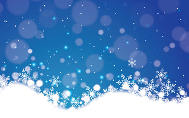 Blue winter abstract bokeh background with snowflake