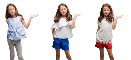 Obraz premium Collage of hispanic young child over isolated background smiling cheerful presenting and pointing with palm of hand looking at the camera.