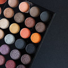 A multicolored set of shadows and blush. Cosmetics for girls and women.