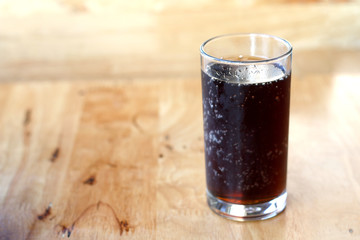 Glass cup of cola drink