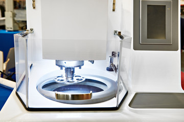 Grinding and polishing system