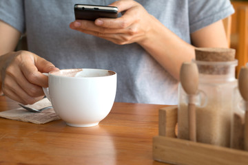 Woman enjoying warming drink, Late coffee in a cup