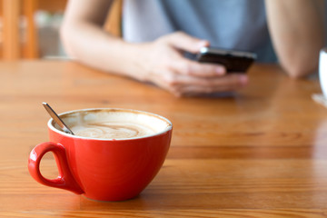 Woman enjoying warming drink, Late coffee in a cup
