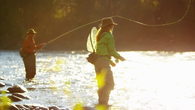 St Mary River male and female Freshwater fly fishing sunrise Canada