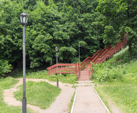 red staircase in a summer park