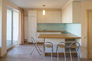 7501174 Modern home interior. Fitted kitchen in the house. The interior of the room.