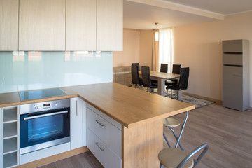 7501177 Modern home interior. Fitted kitchen in the house. The interior of the room.