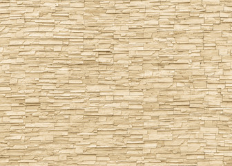 Mur de carreaux de brique de pierre de roche texture âgée de fond détaillé en couleur beige crème jaune