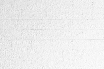 Granite rock stone tile wall aged texture detailed pattern background in light white gray color