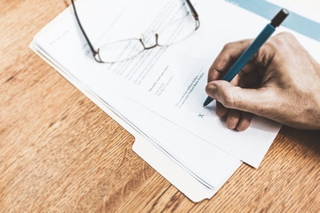 Rental contract agreement for review and signing.  Signing a lease or rental contract.