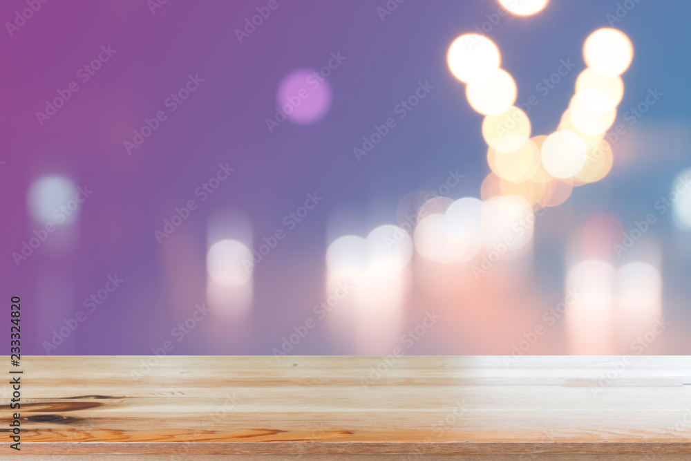 Canvas Prints wooden desk with blurred light bokeh abstract background